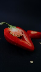red pepper ON A BLACK BACKGROUND