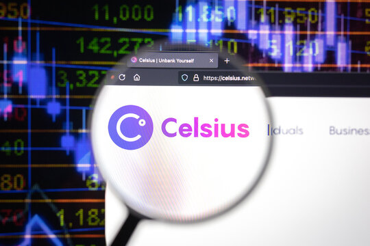 Celsius crypto company logo on a website, seen on a computer screen through a magnifying glass.	