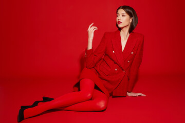 Fashion asian female model in red jacket and skirt. - obrazy, fototapety, plakaty