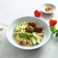 Falafel with couscous and avocado