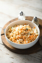 Traditional homemade coleslaw salad with fresh parsley	