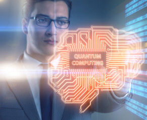The businessman pressing virtual button in quantum computing con
