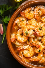 Foto op Canvas Traditional spanish shrimp with garlic and oil © zakiroff