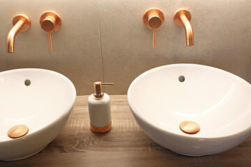 double sink with golden taps