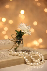 bouquet of flowers on the book