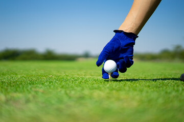 Golf sport played on the outdoor courts of the social elite.