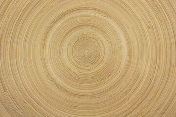 Wooden background, round rings on a wooden background, sawn wood