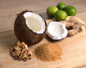 Obraz na płótnie Canvas Jamaican coconut drop with the ingredients, Coconut, Brown sugar Root ginger, and limes. 