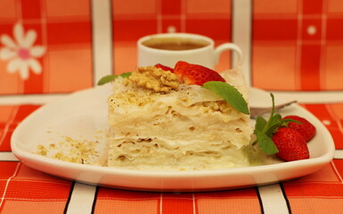 Gullach is a national Turkish dessert made from milk and rice cakes, which has been prepared since the time of the Ottoman Empire. 
Sweet Turkish dessert made from rice dough with milk impregnation.