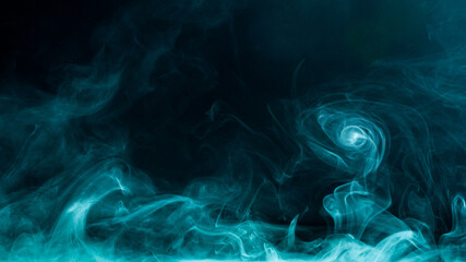 Fototapeta premium Blue steam on a black background