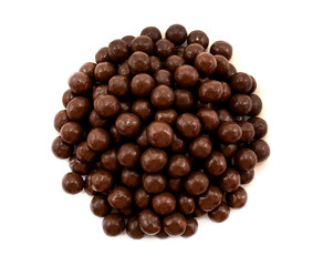 Chocolate milk balls. Background of a large number of brown chocolate balls