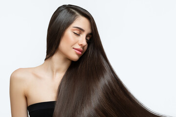 Fashion woman with straight long shiny hair. Beauty and hair care