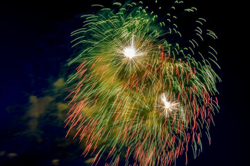 Obraz premium Fireworks in the night sky in honor of Victory Day.