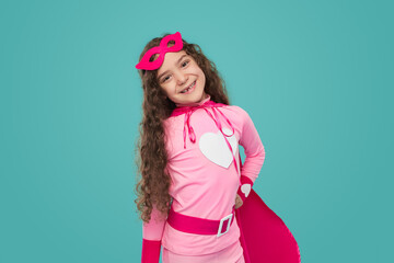 Cute superhero girl in pink costume