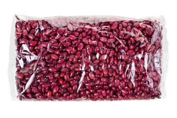 Red beans in a transparent plastic bag isolated on a white background. Top view.