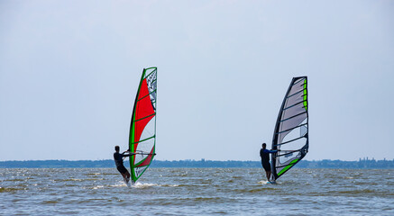 Windsurfing. Entertainment at sea, extreme sports, lifestyle during the summer holidays