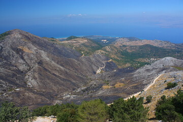 View to incinerator after a fire in the countryside on the Greek island of Corfu
