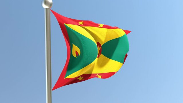 Grenadian flag on flagpole. 
Grenada flag fluttering in the wind.