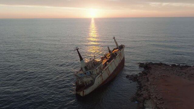 Cyprus - Abandoned shipwreck EDRO III in Pegeia, Paphos, Cyprus from drone view at amazing sunset time