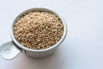 Toasted Sesame Seeds in a Measuring Cup