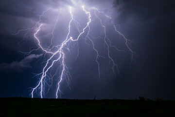 Fototapeta na wymiar lightning storm in the night sky