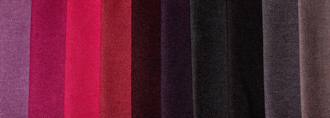 Samples of furniture fabrics.Multicolor fabric texture background.Banner