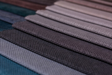 Samples of furniture fabrics.Multicolor fabric texture background.