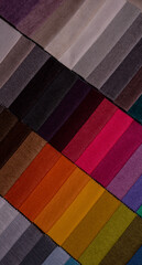 Samples of furniture fabrics.Multicolor fabric texture background.