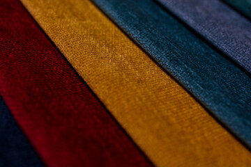 Samples of furniture fabrics.Multicolor fabric texture background. Chenille.