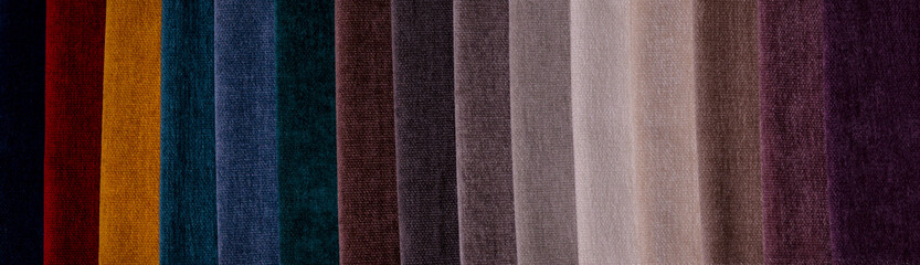 Samples of furniture fabrics.Multicolor fabric texture background. Chenille. Banner