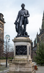 Fototapeta na wymiar Statue of David Livingstone between Glasgow Royal Infirmary and Glasgow Cathedral
