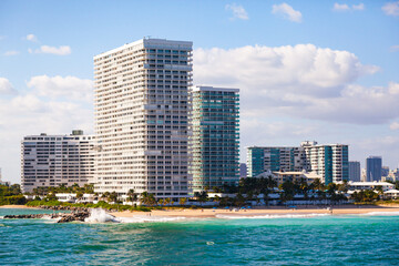 Fototapeta na wymiar View of residential high-rise buildings with a gorgeous beach on the Atlantic Ocean in Fort Lauderdale.