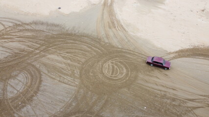 soviet car drifing on the beach