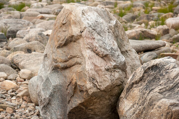 Stones on shore of lake in summer, Karelia, Russia