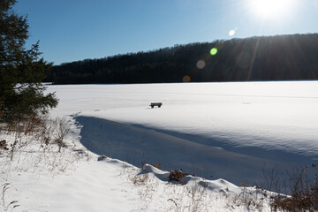 What looks like unfrozen water along the shore is really a shadow cast by a snowdrift. Cole Park...