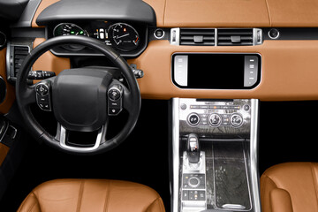 Brown luxury modern car Interior. Steering wheel, shift lever and dashboard. Detail of modern car...