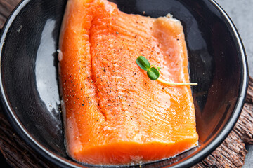 salmon raw fish fresh seafood second course dietary healthy meal food diet snack on the table copy space food background rustic top view pescatarian diet