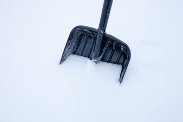 black plastic shovel for snow removal