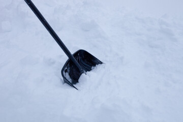 black plastic shovel for snow removal