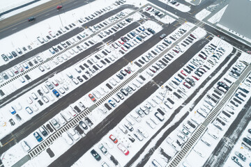parking lot of cars in the snow
