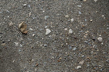 Gravel texture. Floor, street of stones and earth. Stones of many sizes.
