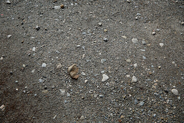 Gravel texture. Floor, street of stones and earth. Stones of many sizes.