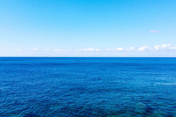 Obraz premium View over the rocky coast of Elba to the blue sea