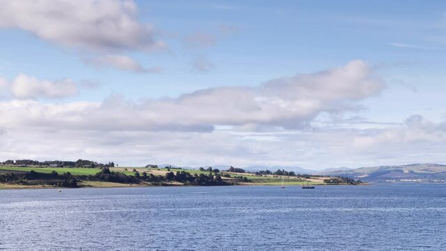 The Black Isle.  A time-lapse recording of the view from Invergordon across Cromarty Firth to the Black Isle.  The Black Isle is a peninsula within Ross and Cromarty in the Scottish Highlands.