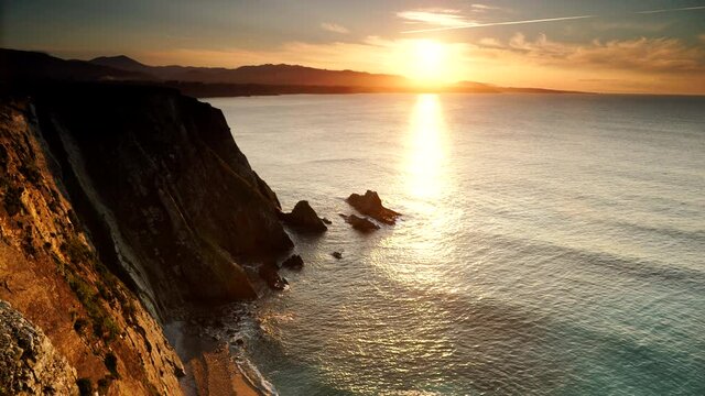 Asturias coast. Sunset over Cabo Busto cliffs, Spain.