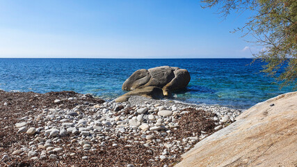 View over the rocky coast of Elba to the blue sea