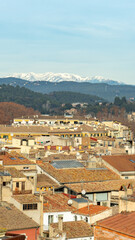 Fototapeta na wymiar Girona cityscape with the mountains at the background