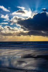 Evening clouds with sun rays