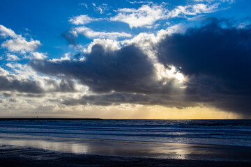 Evening clouds with sun rays
