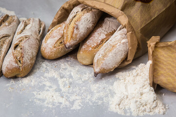 French baguettes on table with flour